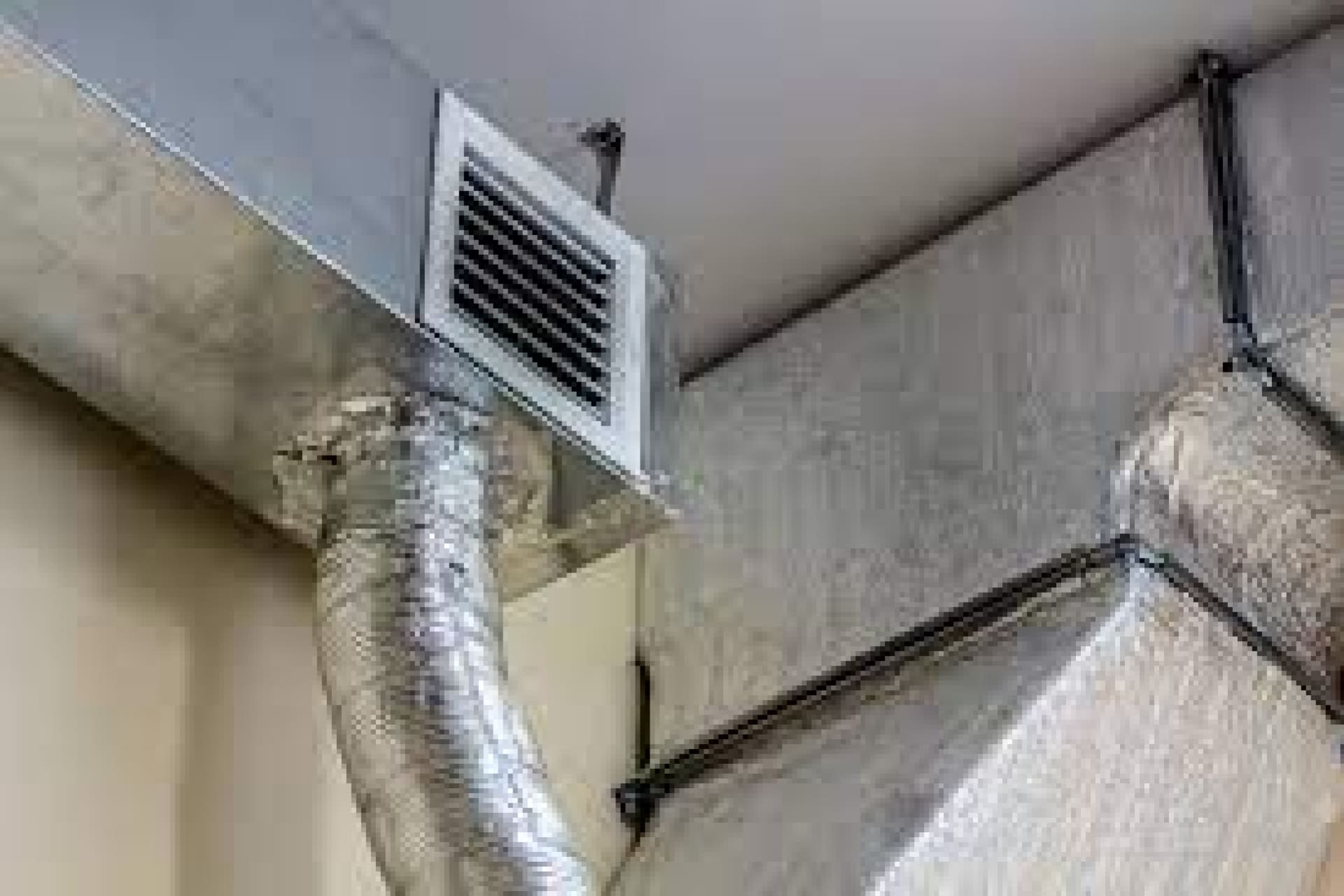 Air duct high on a wall
